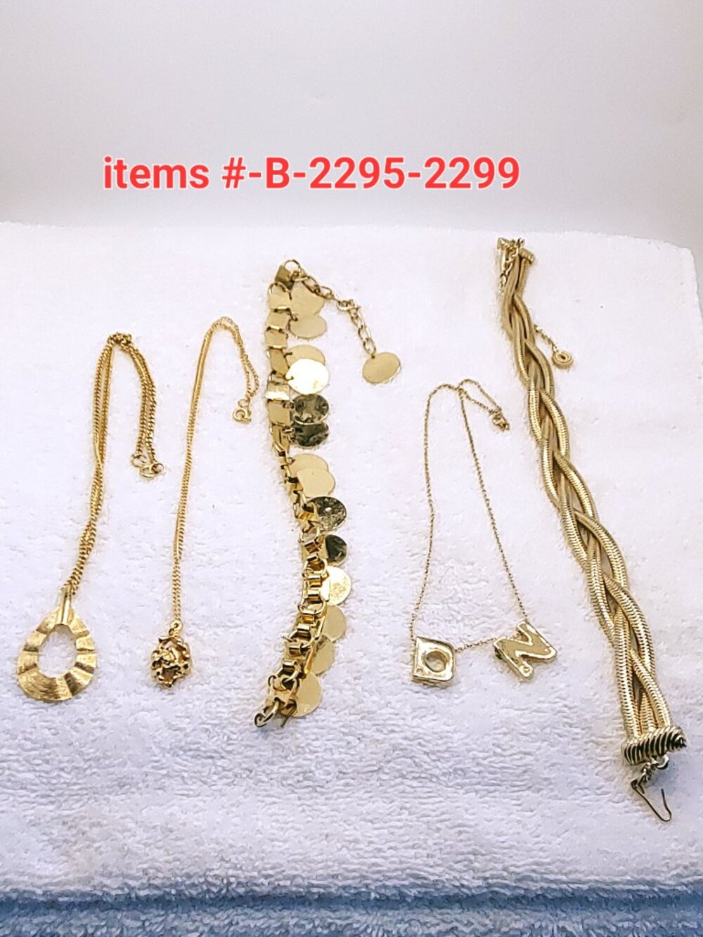 5 Gold necklaces, items # B-2295-2299,. wt. 141 grams.